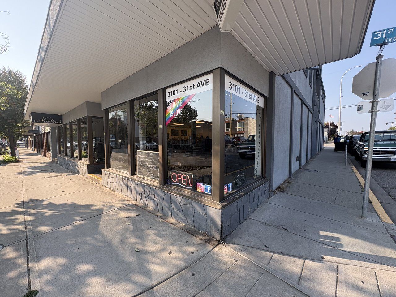 Board game shelves and comfortable seating near the front window